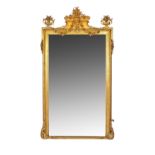 A Victorian gilt framed overmantel wall mirror, with relief floral carved crest,