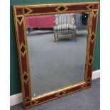 A pair of 20th century rectangular wall mirrors, with painted geometric frames,