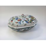 A French faience polychrome tureen with matching Rouen faience cover, 18th century,