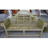 A 20th century hardwood Lutyens style wooden garden bench, 167cm wide x 106cm high.