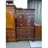 A George III mahogany chest on chest of two short and three long graduated drawers,