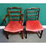 A set of six George II style mahogany wavy ladder back dining chairs, on canted block supports,