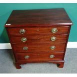 A George III mahogany chest of four long drawers, on bracket feet,