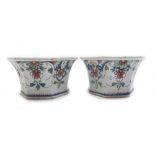 A pair of Rouen faience bough pots, 18th century, each top pierced with holes,
