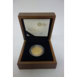 A gold proof two pounds coin, commemorating The Mary Rose, 2011 with a certificate, case and box.
