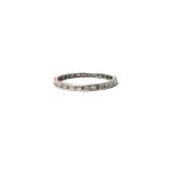 A baguette diamond set full eternity ring, mounted with a row of baguette diamonds,