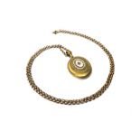 A gold circular link neckchain, on a sprung hook shaped clasp,