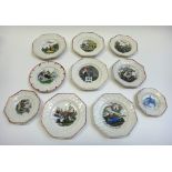 A group of ten pottery nursery plates, 19th century, mostly octagonal,