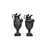 A pair of Wedgwood black basalt 'wine' and 'water' ewers, late 19th century,