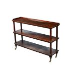 A Regency rosewood three tier serving buffet, with rounded rectangular platform and turned supports,