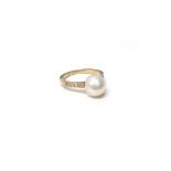 A gold, freshwater cultured pearl and diamond ring,