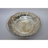 A German bowl, of shaped circular form, with shallow spiral fluted decoration, detailed 835,