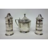 A George III silver oval hinge lidded mustard pot, engraved with a Greek key pattern border,