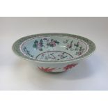 A late 19th century Chinese famille rose bowl decorated with fauna and flora, 37cm diameter,