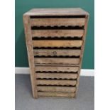 EM Taylor Ltd, Beehive works, Welwyn, Herts, England; a 20th century pine apple storage rack,