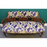 An Edwardian marquetry inlaid rosewood tub back sofa, with bow seat on spiral supports,