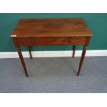 An early 19th century mahogany single drawer writing table, on tapering turned supports,