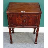 A George III mahogany tray top bedside table, with pair of doors on square supports,