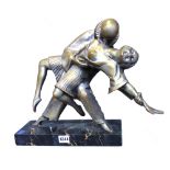 An Art Deco silvered bronze figure group, depicting Pierrot serenading a semi-naked young lady,