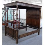 A mid 20th century carved oak four poster bed,