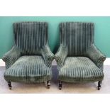 A pair of 19th century French tub back easy armchairs, on turned ebonised supports,