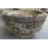 A pair of large reconstituted stone dodecagon shaped jardinieres,