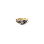 A gold and platinum, diamond set ring,