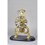 A Victorian style brass skeleton clock of typical open frame form,