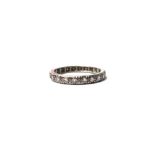 A white gold and diamond set full eternity ring,