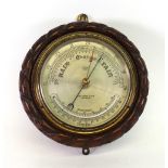 John Barker & Co Ltd Kensington: A Marine Aneroid barometer, with silvered dial,