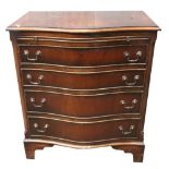 A reproduction George III style mahogany serpentine fronted chest,