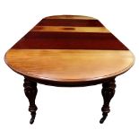 A Victorian mahogany extending dining table, circa 1860,