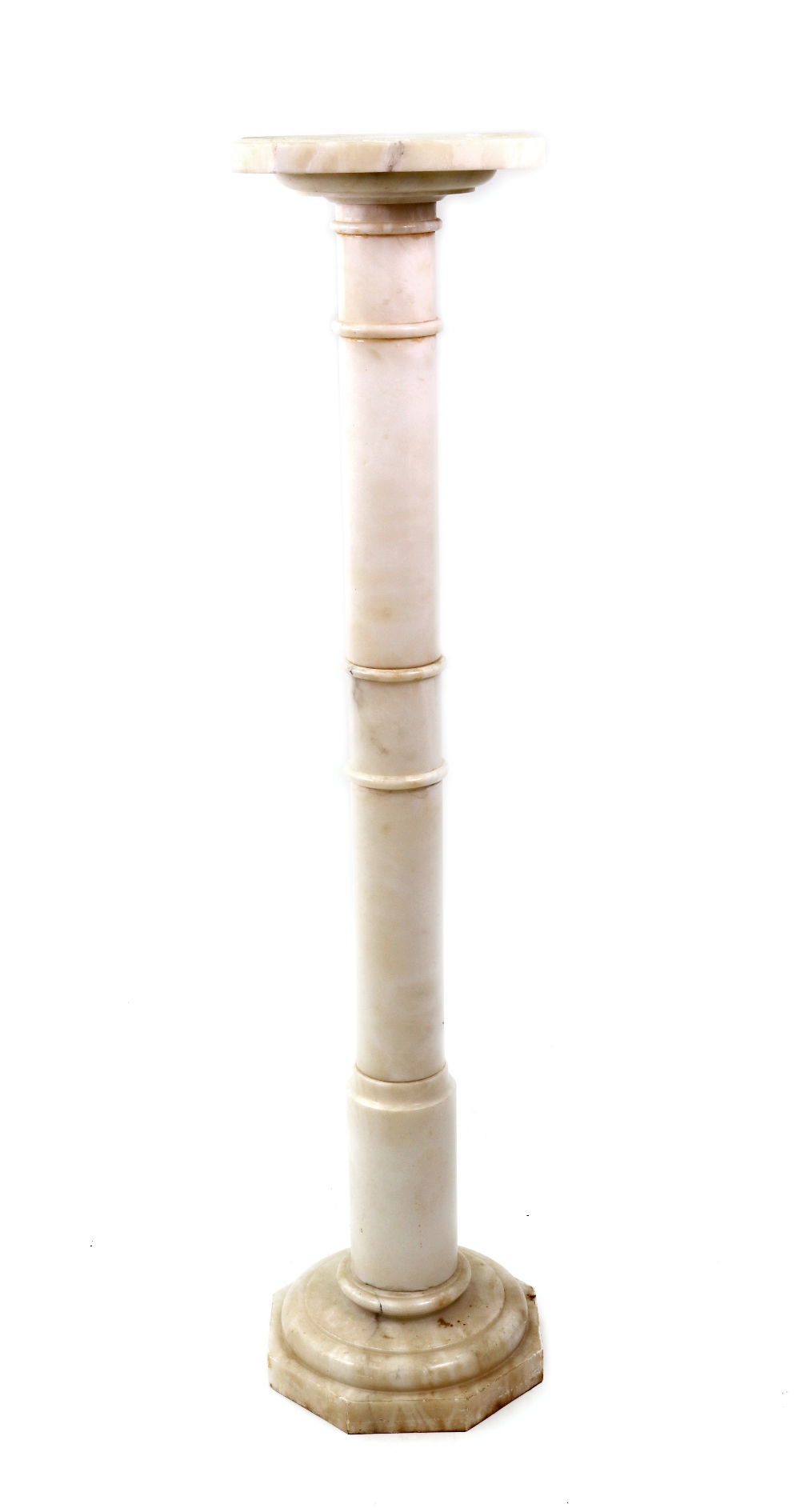 A white onyx marble pedestal, 20th century, with ringed cylindrical column, on an octagonal base,