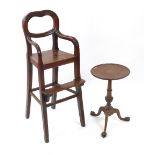 A child's Victorian mahogany balloon back high chair, with solid seat, on splayed legs,