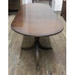 A reproduction Regency style mahogany ebony strung 'D' end dining table,