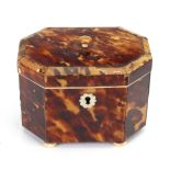 A small Regency tortoiseshell pewter strung octagonal tea caddy, with hinged cover, banded in ivory,