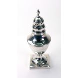 A George III silver vase shape castor, London 1805, makers mark rubbed, with threaded bands,