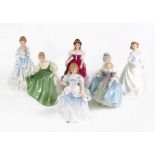 A collection of six Royal Doulton porcelain figures, Laura HN 3760, Megan HN 3887, Claire HN 3646,
