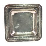 A Turkish silver square dish, 20th century, with a moulded border,