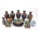 Two pairs of Japanese cloisonne ovoid vases, Meiji period, each worked with flowers and insects,
