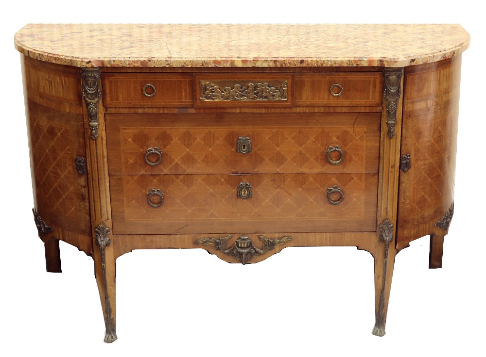 A transitional style ormolu mounted kingwood crossbanded boxwood strung commode, circa 1900,