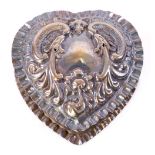 An Edwardian silver heart shape pill box, Birmingham 1902, with crimped sides, foliate embossed,