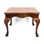 Wylie & Lochhead Ltd, 45 Buchanan Street, Glasgow: A walnut low centre table,