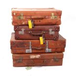 Four various vintage leather suitcases, one by Forsyth, Edinburgh & Glasgow, three monogrammed,