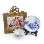 A Sevres style rectangular porcelain plaque, circa 1870, painted with cherubs,