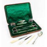 A cased Victorian silver mounted seven piece manicure set, Levi & Salaman, Birmingham 1898 & 1899,