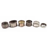 A collection of six silver napkin rings, various dates and makers, Victorian and later,