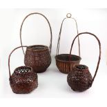 A collection of four Japanese bamboo interwoven baskets, with overhead handles, 36-59cm high,