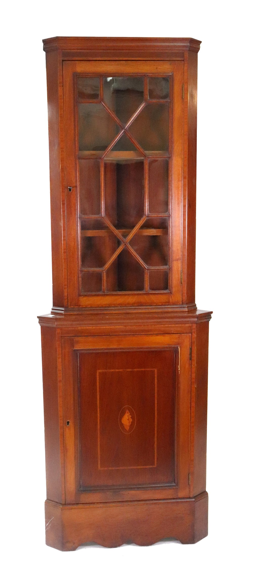 An Edwardian mahogany satinwood crossbanded boxwood and ebony strung floor standing corner cabinet,