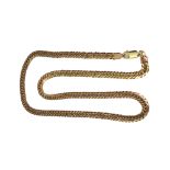 An Italian yellow metal faceted curb link necklace, stamped '375', 46cm, 21.9g.